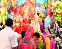 Devotees perform the Ashtami prayer in Haridwar on Friday