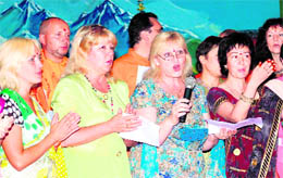 Members of a Russian delegation sing religious songs at Dev Sanskriti University