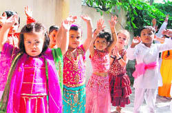 Children celebrate the Navratra festival at Nobel Heart School in Jammu