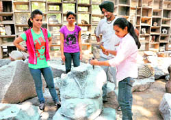 Students creating works of art at the park