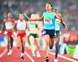 Mandeep Kaur wins the the women's 4x400m relay final of the Track and Field competition. India upset the odds to win the women's 4x400m relay gold medal, crossing the line in 3:27.77. Nigeria came second and England were third