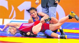 Storming a male-dominated bastion was a dream come true for the wrestler from Bhiwani, Geeta Balali (in blue)