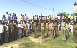 A BSF contingent offers salute to Deep Chand Meghwal who died near the LoC in Rajouri sector in jamu and Kashmir.