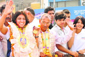 CWG gold medallist in wrestling Anita being welcomed in Bhiwani on Saturday.