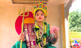 A Muslim girl, Mahapara Mughal, leads a shobha yatra during the navratras.