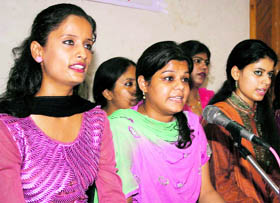 Girls perform during a Dogri music programme Trikuta Di Goonj on the ninth day of navratras at the KL Saigal Hall in Jammu on Saturday.