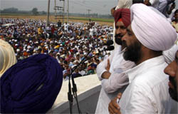 Manpreet Singh Badal addressing a rally outside the Gurdwara Guptsar in village Chhateana near Gidderbaha on Saturday.