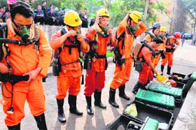 Rescuers outside the coal mine in Yuzhou, Henan province