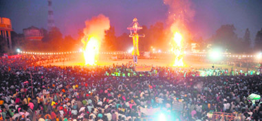 Effigies of Ravanas family go up in flames at the Parade Ground in Dehradun on Sunday.