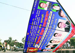 A hoarding that collapsed at Bharat Nagar Chowk, Ludhiana, on Sunday