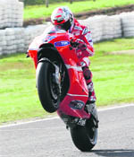 Ducatis Casey Stoner on way to victory in the Australian Grand Prix MotoGP on Sunday.