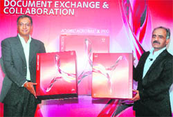 Adobe Systems India Country Head-Sales Sandeep Mehrotra (R) with Country Head-Marketing Prabhjeet Singh at the launch of Acrobat X in New Delhi on Monday.