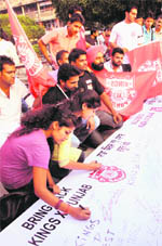 Fans launch a signature campaign in support of Kings XI Punjab at Sector 17, Chandigarh,