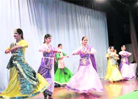 Students perform a cultural dance
