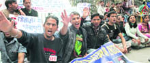 Activists of the Students Federation of India protest against the fake marksheet case at Himachal Pradesh University in Shimla on Monday