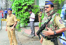 Securitymen outside the Bombay High Court.