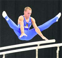 Romanias Flavius Koczi in action in the World Artistic Gymnastics in Rotterdam