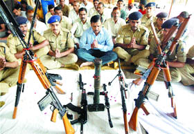 CRPF personnel perform puja of their weapons during Shastra Puja on Dasehra at their camp in Amritsar.