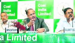 Coal India Chairman Partha S Bhattacharyya, flanked by Secretary in the Coal Ministry C Balakrishnan (L),  and Secretary Department of Divestment Sumit  Bose addresses a press conference on CIL's public offer in New Delhi on Tuesday. 