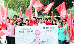 Students of GGDSD College, Sector 32, hold a protest in Chandigarh on Tuesday.