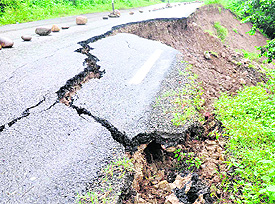 A road damaged by a landslide at the Chilla range of the Rajaji National Park in Pauri Garhwal district. Repairs have to be completed before November 15.