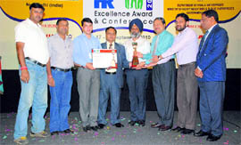 An official of Elin Appliances receives the award in Goa.