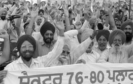 Members of the Allotment Sangarsh Committee in front of the GMADA office in Mohali on Wednesday.