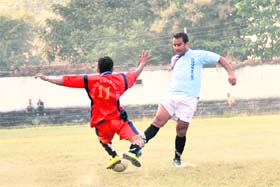 Players vie for the ball at the DFA Challenger Cup in Dehradun