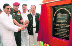 Chief Minister Ramesh Pokhriyal Nishank lays the foundation stone of the the Army Welfare Housing Organisation complex in Dehradun on Wednesday