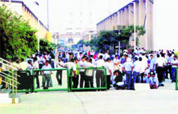 ITC employees hold a protest in Haridwar on Wednesday