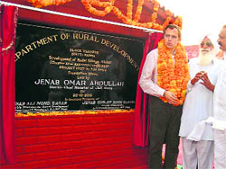 Chief Minister Omar Abdullah lays the foundation stone of a model village, Abtal, at Vijaypur in Samba district on Wednesday