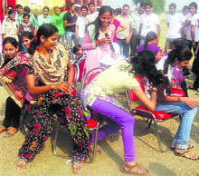 Participants play musical chairs at a fest in Murthal
