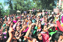 Girls protest as an unidentified man entered their hostel on Wednesday night at Himachal Pradesh University in Shimla. 
