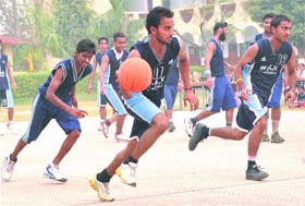 Players in action during an inter-school basketball championship organised by St Soldier Nangal Krar Khan at Jalandhar cantonment