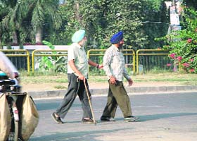 In a Huff: Pedestrians crossing the National Highway No. I in Doraha