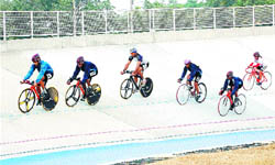 Cyclists compete in the All-India Inter-University Cycling Championship at Guru Nanak Dev University in Amritsar. 
