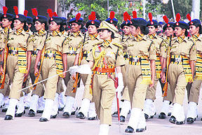 A woman contingent participates in the ITBP Raising Day parade for the first time at the forces Basic Training Centre in Bhanu near Panchkula on Friday.