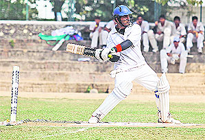 A player in action during the Molly Carver Memorial Tournament in Chandigarh on Friday.