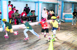 A speed rink race in progress at the All-India Invitational Rink Hockey and Speed Skating Championship in Mussoorie