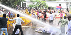 Delhi cops use water canons to disperse BJP activists, who were protesting against the corruption in the Commonwealth Games, in New Delhi