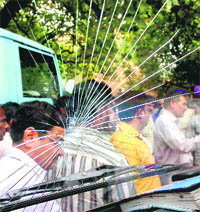 The damaged windscreen of the MC truck during a protest by shopkeepers at the Sector 22 Shastri Market, Chandigarh, on Saturday