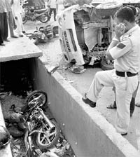 The tempo that overturned after hitting two-wheelers on the Kalka-Zirakpur highway on Saturday