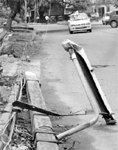 An electric pole that fell during a storm in Sector 19, Chandigarh, on Saturday