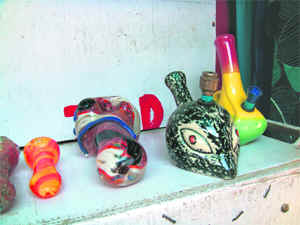 Chillums on display in a shop