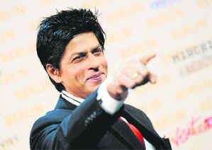 Bollywood actor Shah Rukh Khan poses during a photo call in Berlin, Germany, on Friday. He is working on his new action movie Don-2 in Berlin, where some of the scenes are shot. 