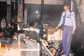 Furniture and computer peripherals damaged in fire that broke out in Phase XI branch of HDFC Bank, Mohali, on Sunday.