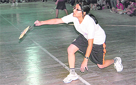 A girl in action at the Uttarakhand Technical University Inter-College Badminton Tournament in Dehradun on Sunday.