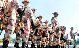 ITBP jawans take part in the Raising Day parade at the force's Basic Training Centre in Bhanu near Panchkula on Sunday.