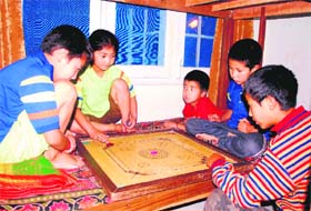 Rescued children allegedly kidnapped by an NGO play caroms in Ladakh house in Jammu