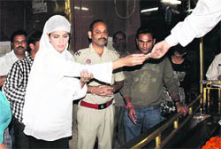 Bollywood actor Katrina Kaif prays at the historical Kali temple in Patiala on Sunday. 